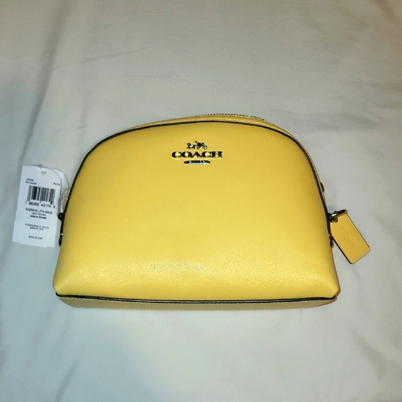 Coach Handbags - Coach Yellow Cosmetic Bag
